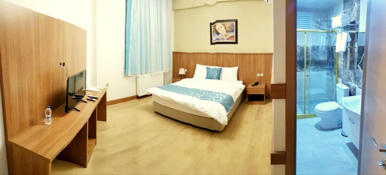 Asil Otel 桑尼乌法 外观 照片